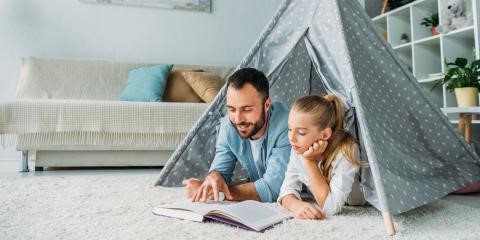 Father and daughter in a tent